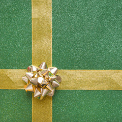 Golden bow and decorative ribbons