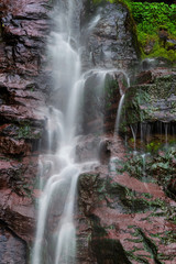 Obraz premium Beautiful waterfalls, Kaaterskill Falls in Catskill Mountains of New York. Long exposure.