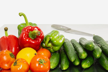 Vegetable group composition made from sweet pepper cucumber tomato on white background.