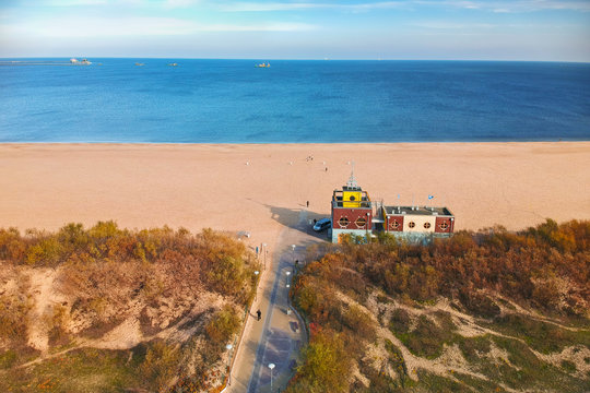 Aerial landscape of the beautiful beach with lifeguards house at Baltic Sea in Gdansk, Poland