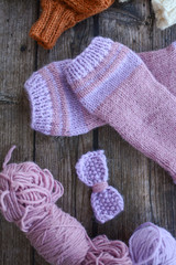 Fototapeta na wymiar Warm and soft girl socks, winter fashion, made of wool