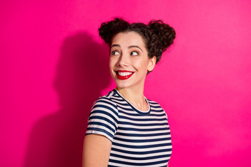 Photo of cheerful charming gorgeous fascinating pretty girl looking away turned smiling toothily isolated over fuchsia vivid color background