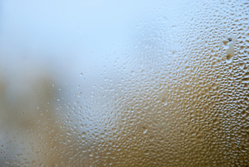 Fototapeta na wymiar natural water drop on glass