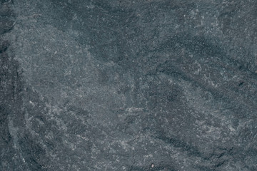 texture of fine natural gray stone closeup for background