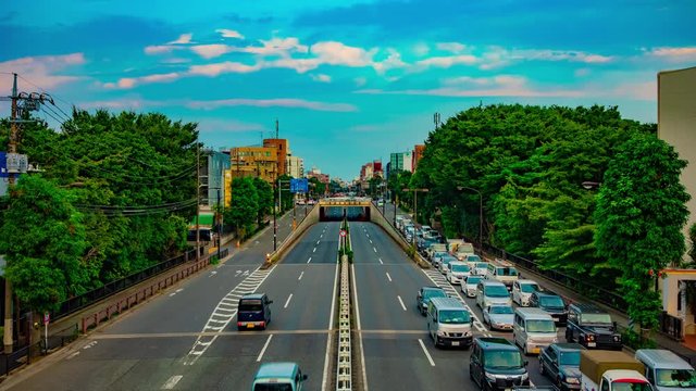 A timelapse of downtown street at Kanpachi avenue in Tokyo daytime wide shot