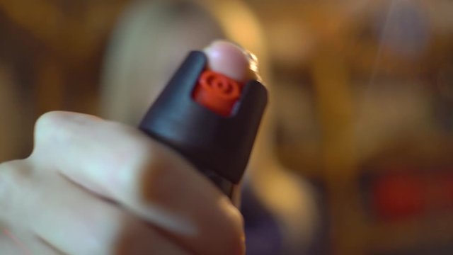 A woman in a dark alley waved pepper scaring off a robber,