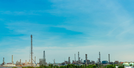 Fototapeta premium Oil refinery or petroleum refinery plant. Power and energy industry. Oil and gas production plant. Petrochemical plant. Chemical pipeline. Natural gas storage tank with sky. Petroleum engineering.