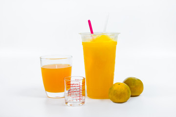 Slush ice with orange in Plastic Cup white background.