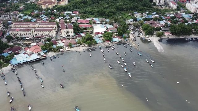 Row of boat at coastal Malays fishing village Gertak Sanggul, Penang.