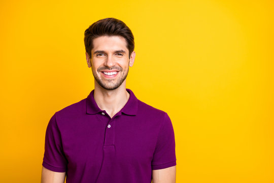 Close-up portrait of his he nice attractive cheery cheerful guy wearing lilac shirt isolated over bright vivid shine vibrant yellow color background
