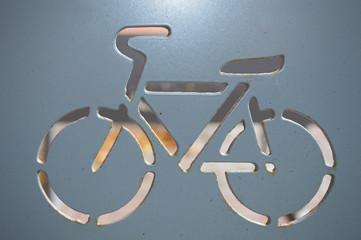 Bicycle sign carved on a metal sheet