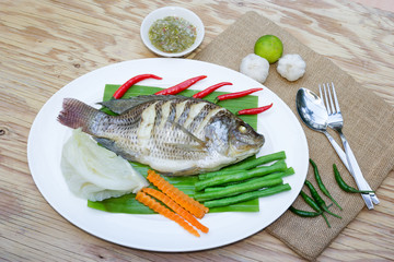 Steamed Nilotica fish,thai style steamed fish with vegetable