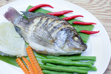 Steamed Nilotica fish,thai style steamed fish with vegetable
