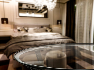 Glass coffee table and free space for your decoration. blurred home interior 