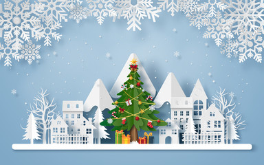 Fototapeta na wymiar Origami paper art of Christmas tree in the village with the mountain, Merry Christmas and Happy New Year
