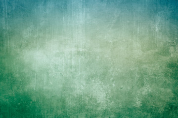 Fototapeta premium Blue and green grungy canvas background or texture