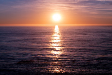 Obraz premium Sunset Over the Ocean