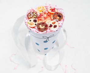 Chocolate candy set in a paper basket