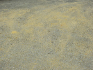dirt asphalt road with sand