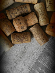 wine corks on grey wood background