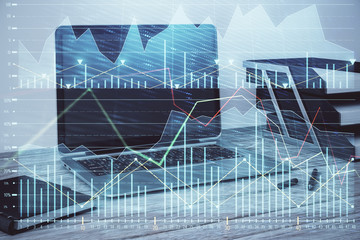 Stock market chart and desktop office computer background. Multi exposure. Concept of financial analysis.