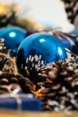 Photography of Christmas items on a garland.