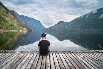 Zelfklevend Fotobehang man looking on the lake and fjords © Marcin