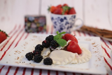 Homemade dumplings with fruit. Tasty traditional food