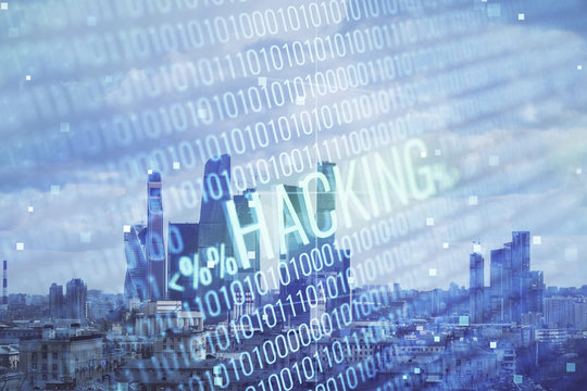Double exposure of hacking theme drawing hologram on cityscape background. Concept of data cyber piracy