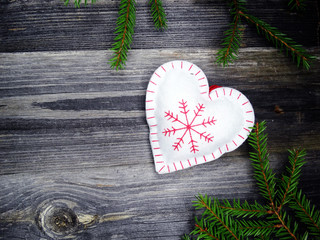 christmas decoration and garland lights on vintage wooden background