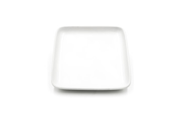 One square white ceramic plate isolated on white background