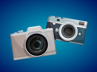 Two compact cameras on blue background