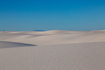 Fototapeta na wymiar Light and shade on the sand dunes, at White Sands National Monument in New Mexico
