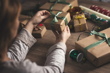 Woman packing Christmas gift