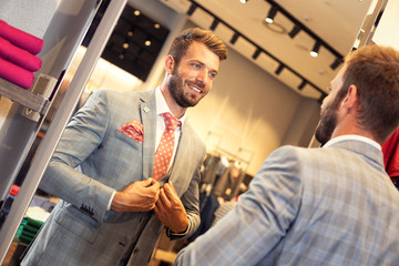 confident man satisfied look his in mirror