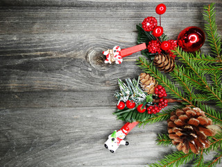 christmas decoration and garland lights on vintage wooden background