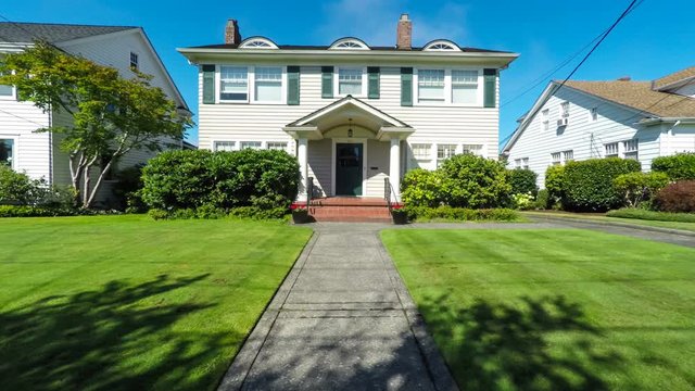 Approaching An American Colonial Style Suburban Home; Dolly Shot