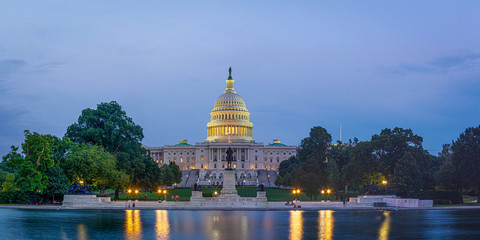Panorama of the Capitol of the Unites States in evening light with the Capitol Reflecting Pool in the foreground. - obrazy, fototapety, plakaty