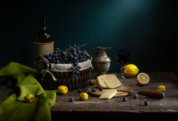 Vintage still life with grape and cheese