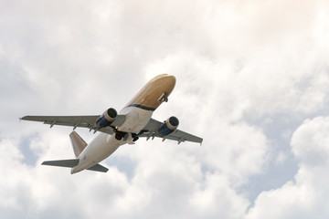 Aviation, travel, air transportation concept. Passengers commercial airplane or business jet flying among the clouds.