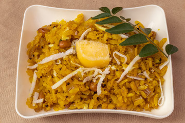 Poha popular healthy Indian breakfast dish made with flattened rice