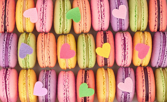 French colorful macarons background, close up