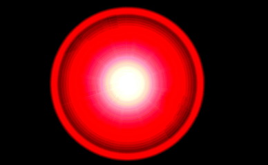 Red abstract circle with white center on black background