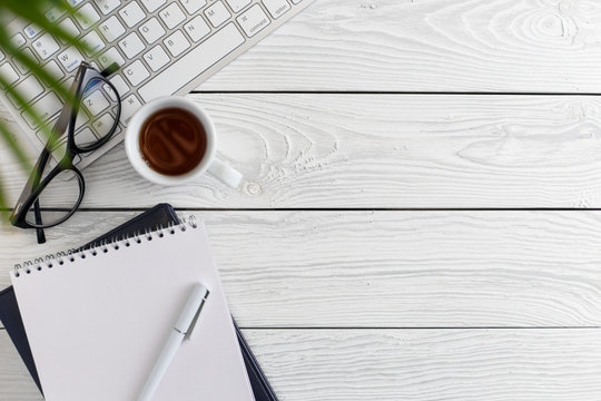 Office desk table with copy space, view from above