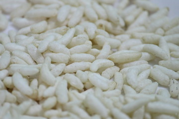 close-up shot of lot of Puffed rice with white background