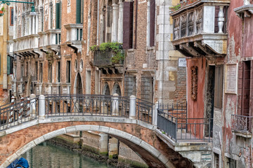 Obraz na płótnie Canvas Venice bridge and channel reflections