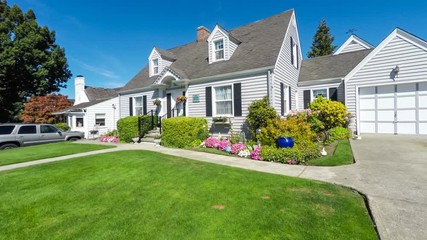 Quaint American suburban home; departing dolly shot - Powered by Adobe