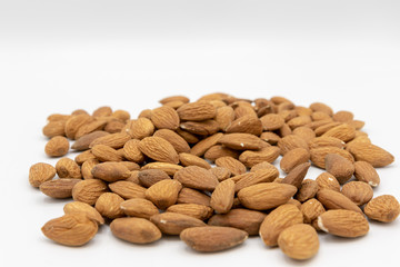 Almonds group on white background 
