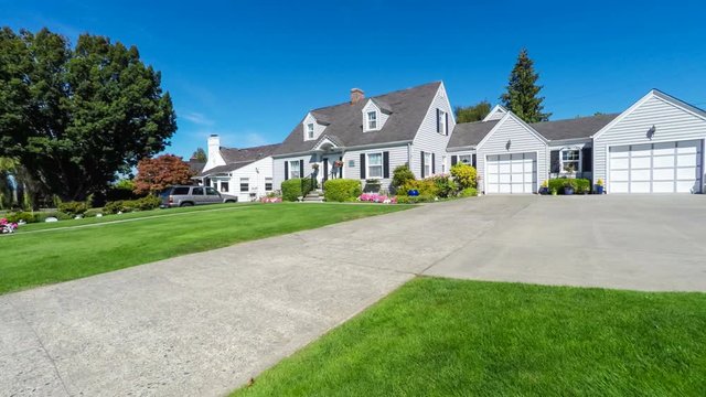Quaint American suburban home; approaching dolly shot