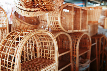 Handmade wicker furniture, products and souvenirs at the street craft market.